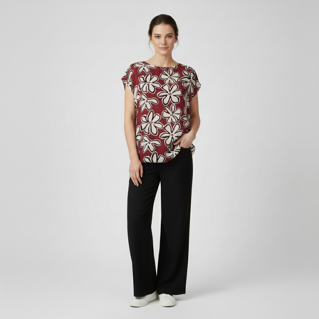 Burgundy blouse with black and white cow print 