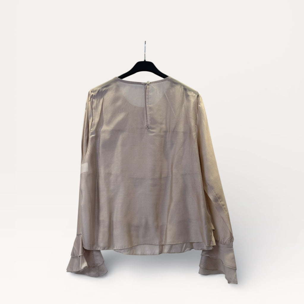 Blusa a balze con volant e maniche a campana