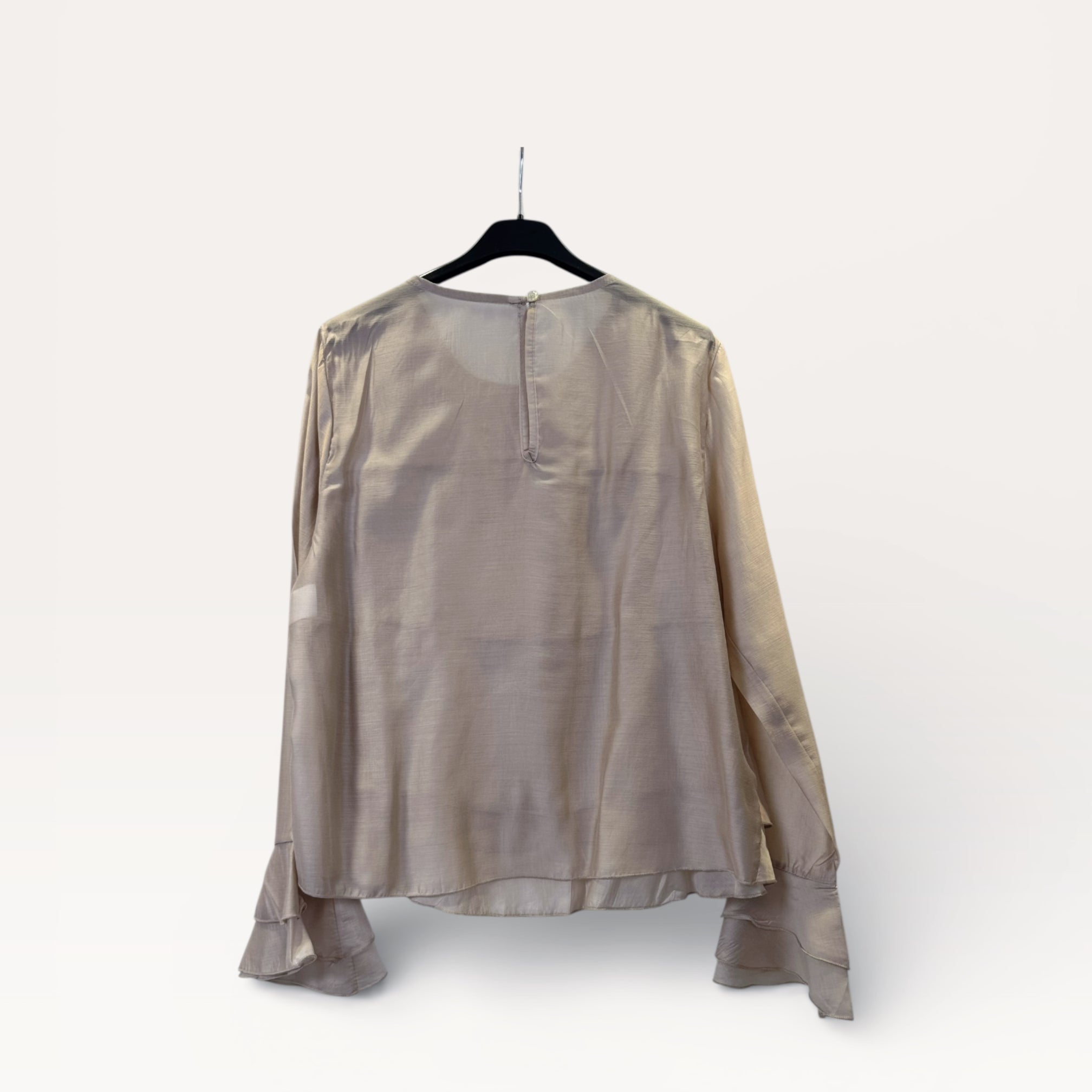 Blusa a balze con volant e maniche a campana