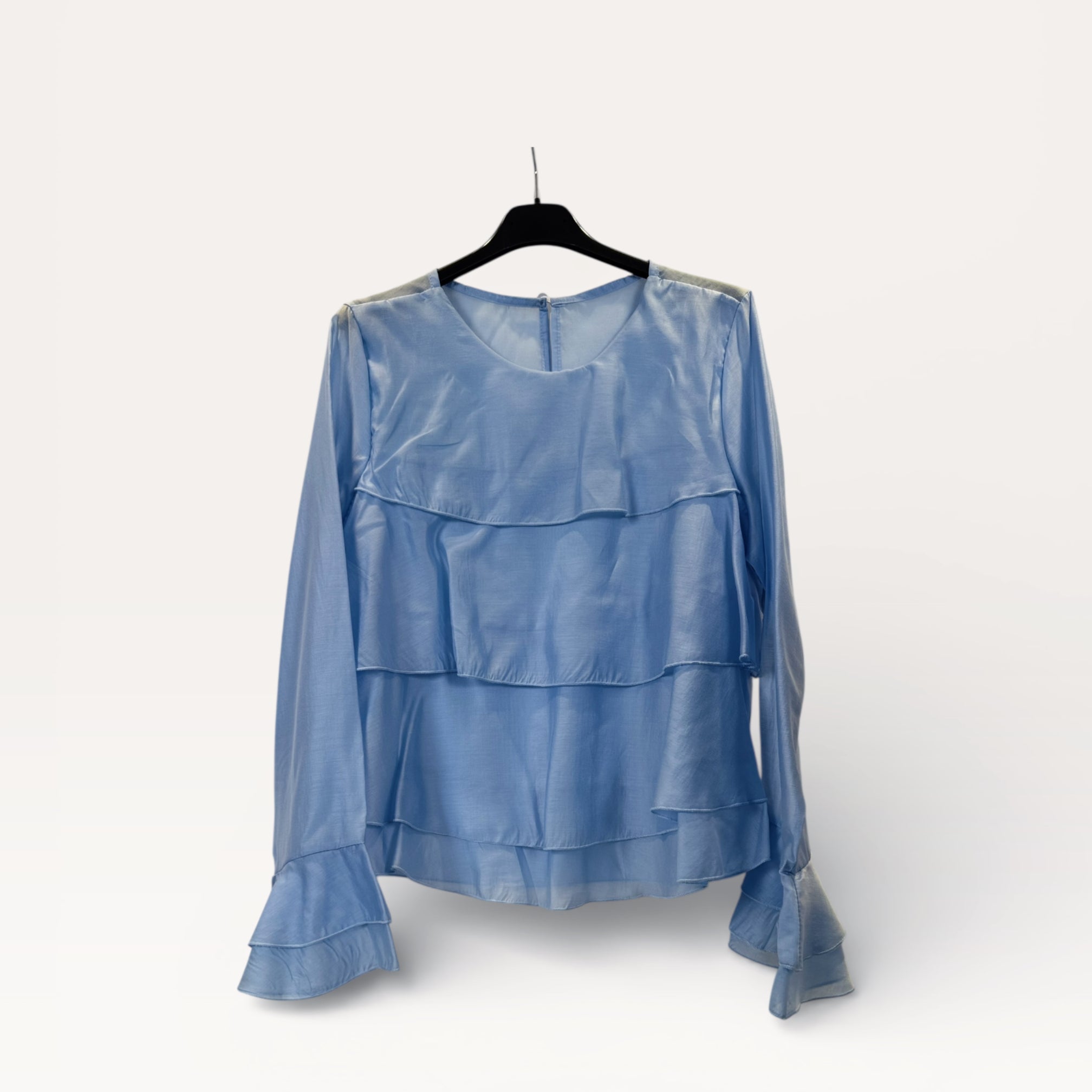 Blusa a balze con volant e maniche a campana