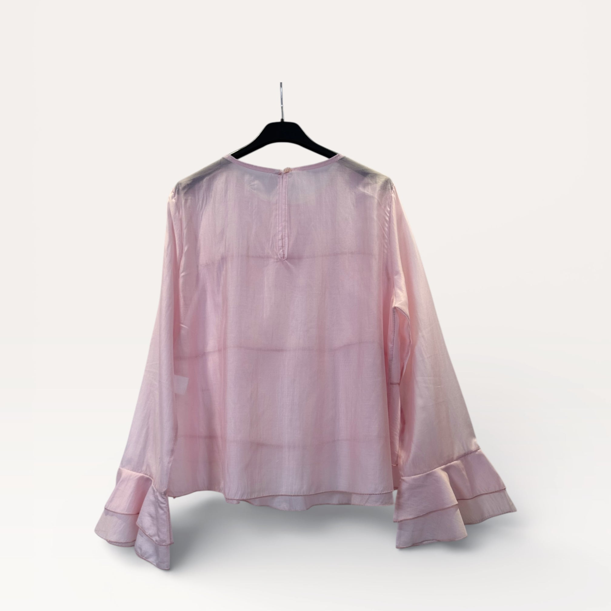 Blusa a balze con volant e maniche a campana