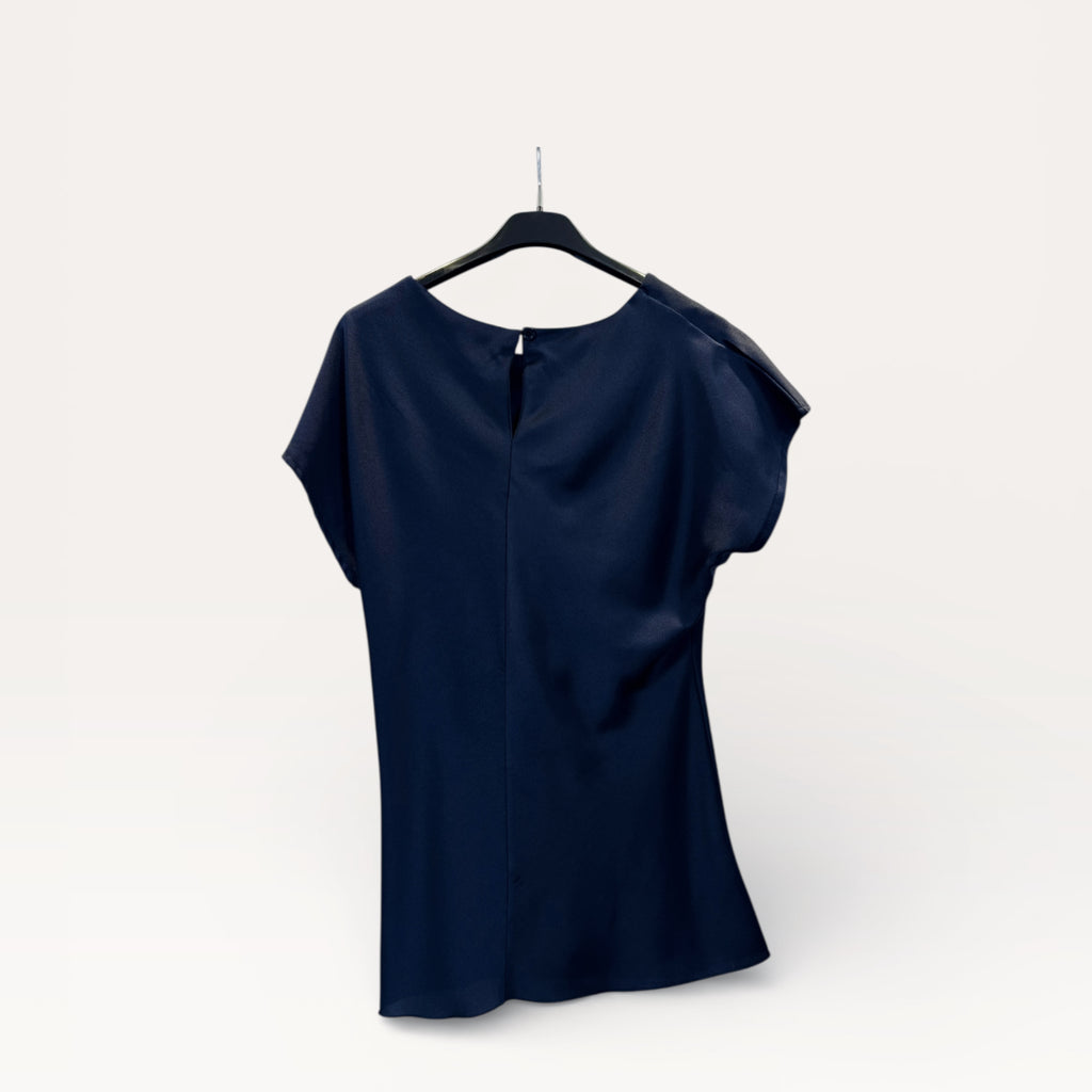 Blusa in satin drappeggiata con nodo laterale
