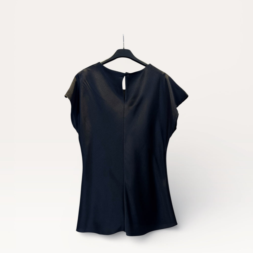 Blusa in satin drappeggiata con nodo laterale