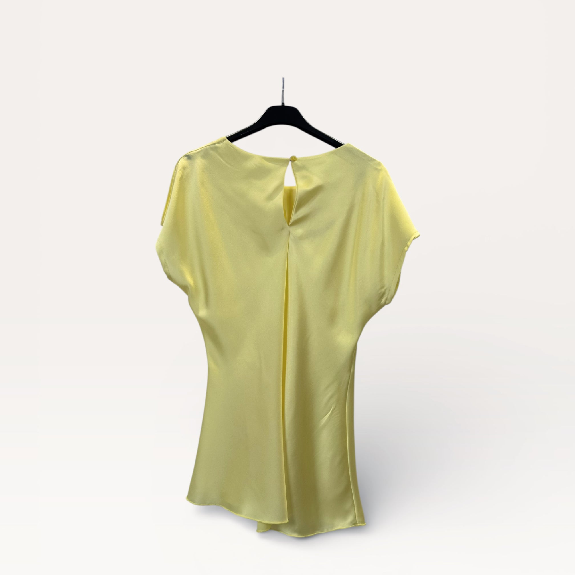 Blusa in satin drappeggiata con nodo laterale