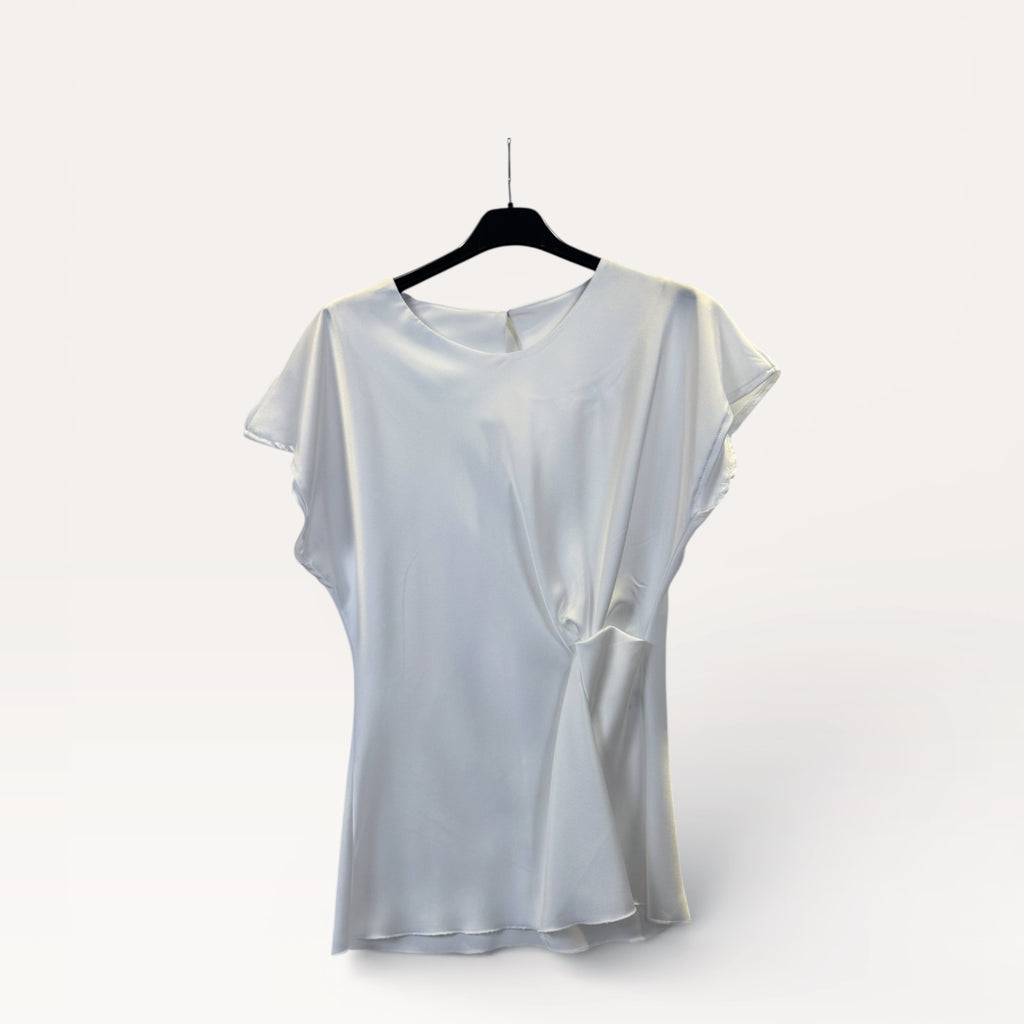 Blusa in satin drappeggiata con nodo laterale